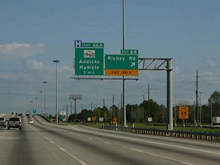 Entering the diamond interchange (Exit 64) with Richey Road on IH 45 north. Richey Road is an arterial west to Ella Boulevard and east to FM 1960 in north Houston.
