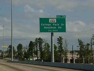 Exit 77 ties into a trumpet interchange with Lake Woodlands Drive west by The Woodlands Mall. The ensuing ramps are Exit 79B for SH 242 (College Park Drive) and Needham Road and the flyover (Exit 79B) for SH 242 west.