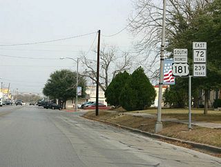 This sign assembly shows the triple overlap through Kenedy of Business US 181, SH 72 and SH 239.