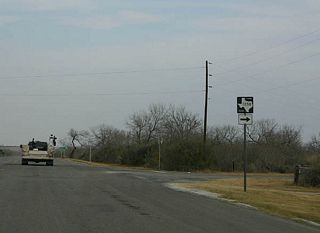 FM 1358 travels southeast to Karon, then west to IH 37.