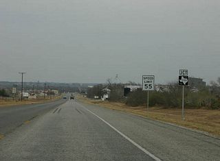 FM 2102 connects Kenedy and FM 626 near Lenz, continuing west after Lenz to FM 99.