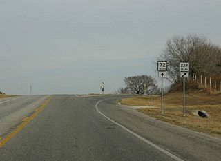SH 239 departs from SH 72 here, to travel southeast to Goliad, eventually ending in Austwell.