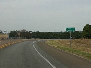 Leaving Yorktown, motorists see this distance sign to Cuero (SH 72) and Yoakum (on US 77A).
