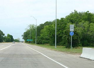 Reassurance marker and hurricane evacuation route trailblazer posted along Texas 288 northbound after Texas 35.