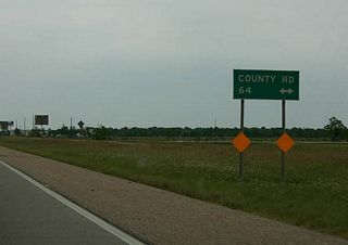 Texas 288 north at Brazoria County Route 64, an east-west road through Iowa Colony between County Road 48 and Masters Road northeast to Manvel.