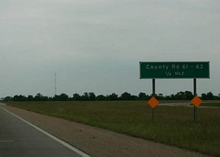 A short connector road joins the Texas 288 mainline with its frontage road system (Green Valley Drive) to provide the connections to Brazoria County Route 61 and 63 to the south. A future diamond interchange will be built here.