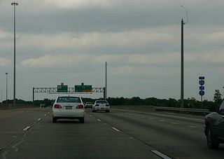 Seeing a reassurance marker at an exit is rare in Texas. This marker is posted due to IH 610 being a designated Hurricane evacuation route from SH 288.