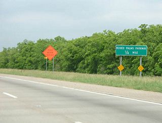Rodeo Palms Parkway, a fairly new suburban highway, stems west from Texas 288 in Manvel to subdivisions north of Texas 6 and south of Croix Road.