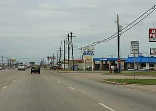 Texas 288 (Brazosport Boulevard) angles northwest through north Freeport to industrial south Lake Jackson.