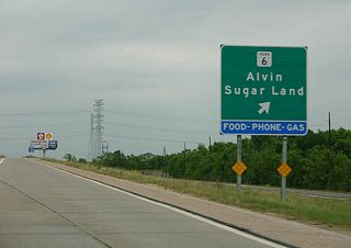 Northbound Texas 288 at the Texas 6 ramp departure to Morris Avenue. Texas 6 travels 11 miles to Alvin (Texas 35) and 17 miles northwest to U.S. 59 at Sugar Land.