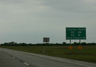 Brazoria County Route 60 west ends at Brazoria County Route 48; eastbound leads to Brister Road. Green Valley Road constitutes the frontage road system north to County 62 in southern reaches of Iowa County.