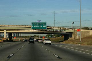 Advance signage for S MacGregor Way and N MacGregor Way, serving the Texas Medical Center. Photo taken 11/2/05.