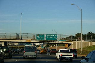 Southmore Street and Blodgett Street exit here. The next exit is US 59.