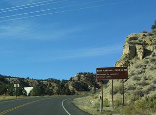 The eastern boundary of Zion National Park is 7.31 miles west of U.S. 89. The fee station for Zion N.P. is 13 miles from Mount Carmel Junction.