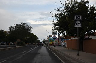 Curving west, SR 9 (E State Street) meets SR 59 ahead at Main Street.