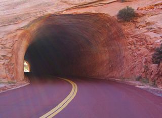 With the first tunnel along Zion-Mount Carmel Highway west, motorists can see end to end without difficulty. The same cannot be said for the curving Zion-Mount Carmel Tunnel.