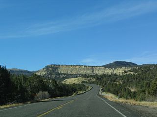 SR 9 navigates through an S-curve west from mile marker 51 across Meadow Creek.