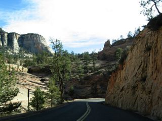 Utah 9 retains its narrow sense as it passes by this cliff in Zion.