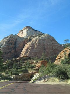 The Zion-Mount Carmel Highway (Utah 9) approaches Bridge Mountain, under which the highway will pass to reach the Zion Narrows.