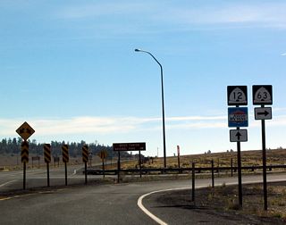 Shields for Utah 12 and Utah 63 as seen from the exit-only right lane.