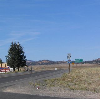 Westbound Utah 12 shield and mileage sign after Utah 63.