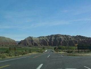 Utah 12 east meets Main Street (Kodachrome Road) in downtown Cannonville. Utah 12 continues east into the northern reaches of the mammoth Grand Staircase-Escalante National Monument, then turns northeast toward Escalante and Escalante State Park.
