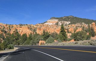Utah 12 passes these spires and rock formations in Red Canyon after the tunnels.