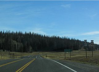 Eastbound Utah 14 at Utah 148. Utah 148 is closed in winter due to seasonal snowfall, thus making Cedar Breaks National Monument inaccessible at that time.