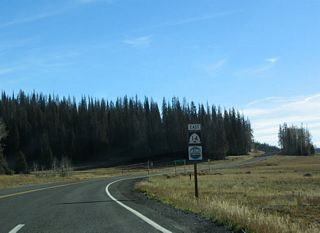 Utah 14 east and scenic byway shield after the Utah 148 intersection in the heart of Dixie National Forest.