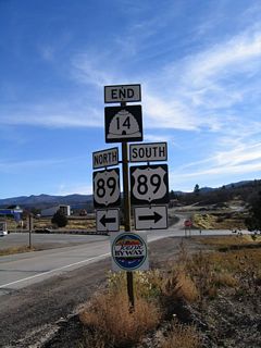 In 2003, the end Utah 14 east shield was flanked by two U.S. 89 shields, one for each direction. This changed by 2009. The scenic byway continues in both directions along U.S. 89.