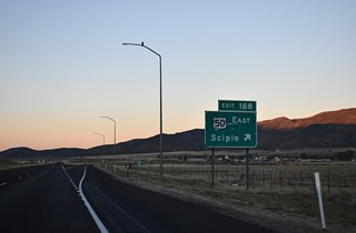 U.S. 50 turns south onto State Street (old U.S. 91) en route to Round Valley between the Pahvant Range and Valley Mountains. The I-15 Frontage Road to the south diverges east along old U.S. 50-91 to Center Street in Scipio.