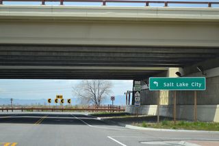 Westbound Parrish Lane approaches the ramp to Utah 67 south (at Exit 7). Utah 67 south has a control city of Salt Lake City, even though Utah 67 does not enter downtown Salt lake City.