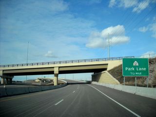 After the offramp to U.S. 89, travelers approach the penultimate exit along Utah 67 (Legacy Parkway) north to Exit 12, Utah 225 (Park Lane).