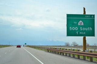 Southbound Utah 67 (Legacy Parkway) approaches Exit 4, 500 South to Utah 68 (Redwood Road) (one mile).