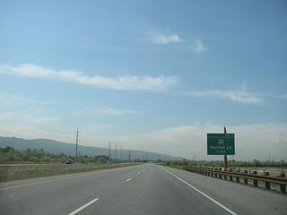 The next exit along Utah 67 (Legacy Parkway) south is Exit 7, Parrish Lane (one mile).