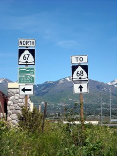 These signs for Utah 67 (Legacy Parkway) and Utah 68 (Redwood Road) are posted along eastbound West 500 South. Turn left ahead for Utah 67 north or continue straight ahead for the connection to Utah 68 (Redwood Road).