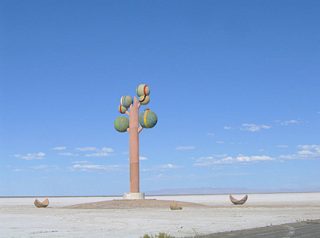 Several broken spheres on the ground represent &quot;fruit&quot; that have fallen from the tree. Unfortunately for prospective visitors, there is no access to the sculpture and the I-80 shoulder is reserved for emergency parking only.