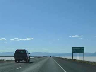 A second distance sign posted between Exits 41 and 4 shows ten miles of progress since the last installation. Elko reappears here at 130 miles out.