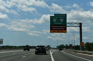 A distributor roadway separates at Exit 47 for SR 234/234 Business (Sudley Road).