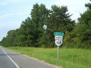 SR 168 (Great Bridge Bypass) passes between the Coopers Creek Manor and Kensington Chase subdivisions beyond this confirming marker posted north of Exit 10.