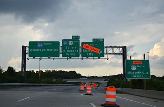 U.S. 17 (Dominion Boulevard) angles southwest along a limited access expressway to the tolled Veterans Bridge spanning the Elizabeth River Southern Branch. U.S. 17 crosses the North Carolina line in 16.97 miles en route to Elizabeth City.