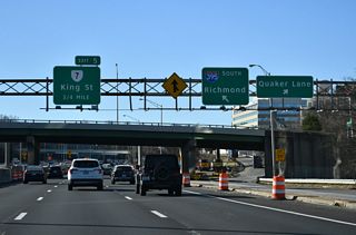 Although unmarked from I-395, Quaker Lane is SR 402 south 1.82 miles to SR 236 (Duke Street) at Cameron Valley in Alexandria.