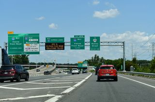The exit from the I-495 Express Lanes to I-66 separate into ramps for Interstate 66 east to Constitution Avenue (U.S. 50) in Washington and west to both the Express Lanes and general travel lanes to Centreville and Manassas.