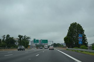 Exit 45B carries drivers onto Dulles Access Road east to McLean (Exit 19) and I-66 east. I-66 spurs into Washington via the Theodore Roosevelt Memorial Bridge, ending at K Street and the Whitehurst Freeway (U.S. 29). I-495 south meets the freeway directly in 2.5 miles.