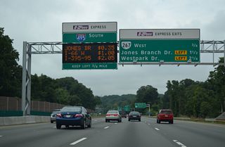 Dynamic message signs display the toll rates for the I-495 Express Lanes. All ramps from the HOT lanes depart independent of the I-495 mainline. The first three of those ramps serve Tysons Corner over the next 2.25 miles.