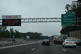 Leaving Tysons Corner, I-495 winds southwest to cross paths with Interstate 66 at a directional cloverleaf interchange (Exit 49) in 0.75 miles.