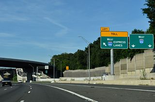 Exit 49 separates for ramps to the outside lanes of Interstate 66 west ahead of SR 243 (Nutley Street) to Vienna and the I-66 Express Lanes ahead of SR 123 (Chain Bridge Road) to Fairfax.