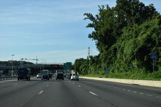 Reassurance marker posted for Interstate 495 ahead of the U.S. 29 (Lee Highway) overpass. Ramps connect the south side of Lee Highway with the I-495 Express Lanes.