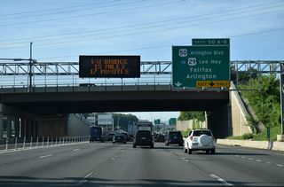 A collector distributor roadway (Exit 50) departs Interstate 495 south for U.S. 50 (Arlington Boulevard) at Merrifield.