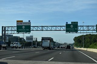 Gallows Road continues south from U.S. 50 (Arlington Boulevard) to meet Interstate 495 at a parclo interchange (Exit 51) in one half mile.